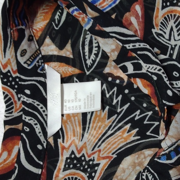 Sheer Sleeveless Blouse - Picture 3 of 3